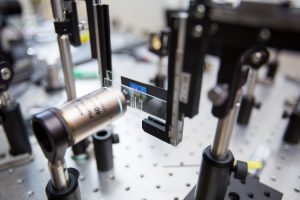 A portion of the team’s experimental setup for capturing an image using a metalens. The researchers capture an image of flowers through a metalens (mounted on a microscope slide) and visualize it through a microscope.